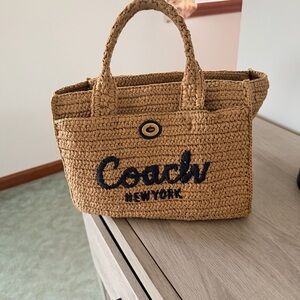 Coach Tan Straw Tote with Black Script Logo
